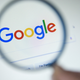 Google homepage under magnifying glass